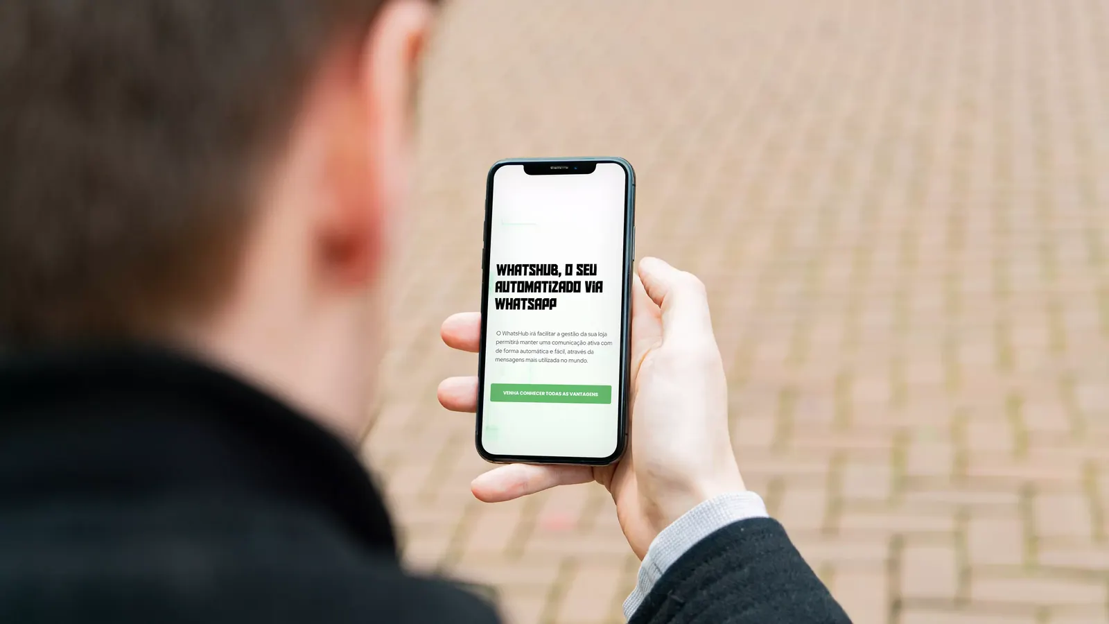 WHATShub landing page on a phone