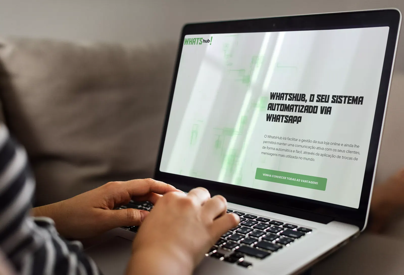 WHATShub landing page on a laptop