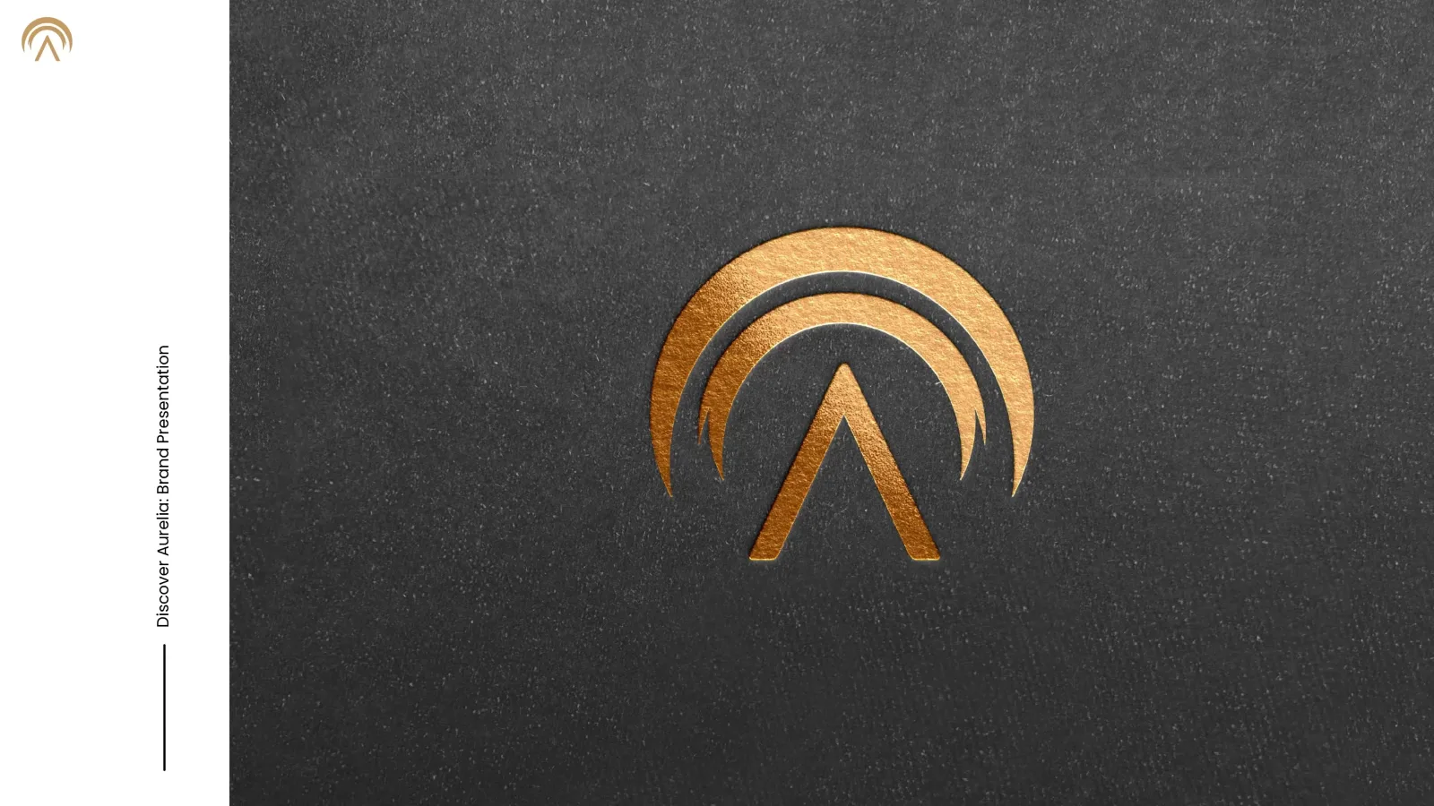 Gold Aurelia symbol embossed on a dark surface